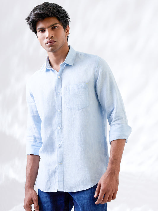 Solid blue shirt made from natural Indian linen, tailored in small batches