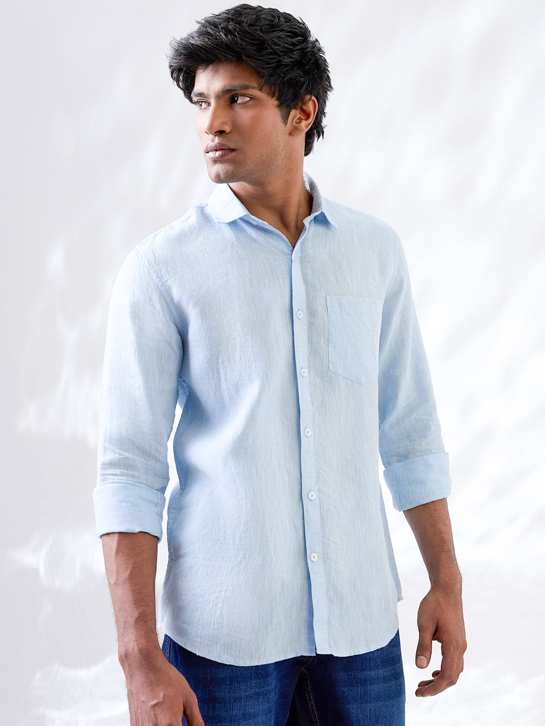 Solid blue shirt made from natural Indian linen, tailored in small batches