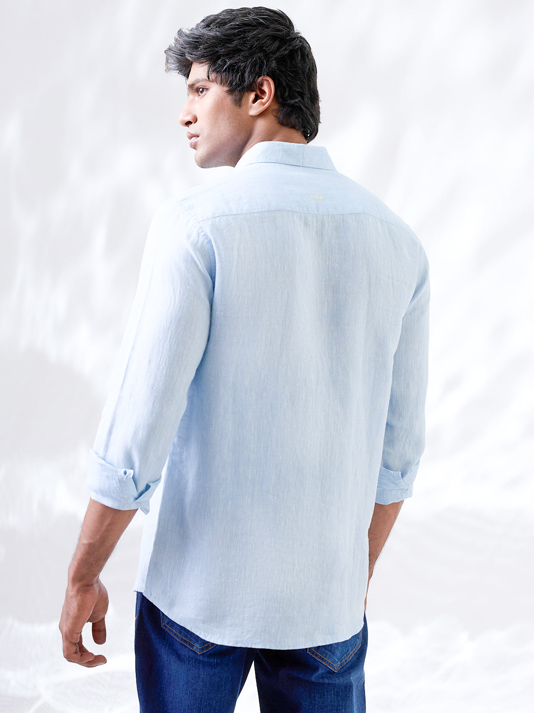 Solid blue shirt made from natural Indian linen, tailored in small batches