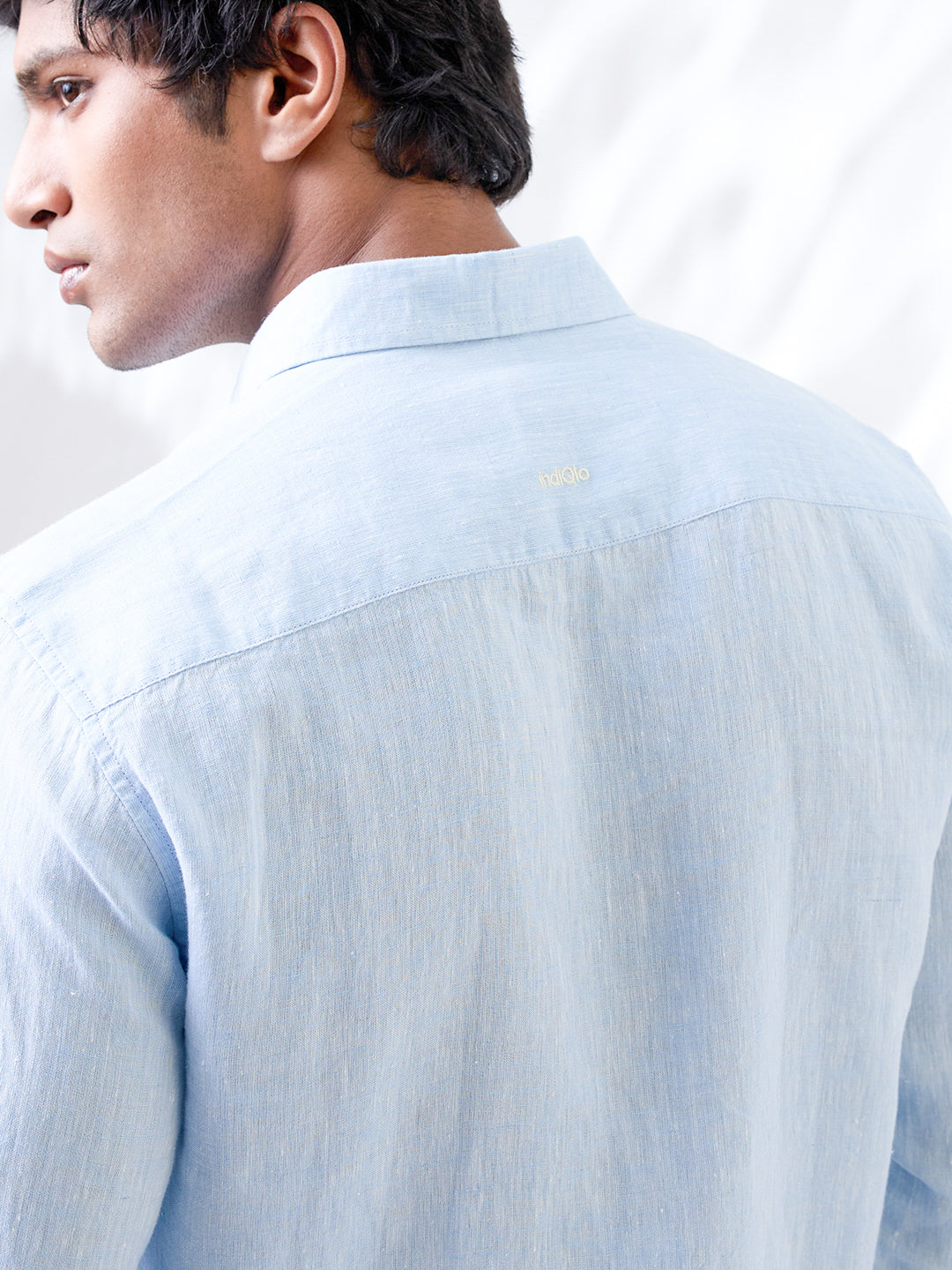 Solid blue shirt made from natural Indian linen, tailored in small batches