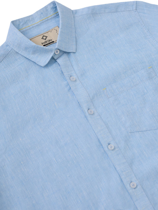 Solid blue shirt made from natural Indian linen, tailored in small batches