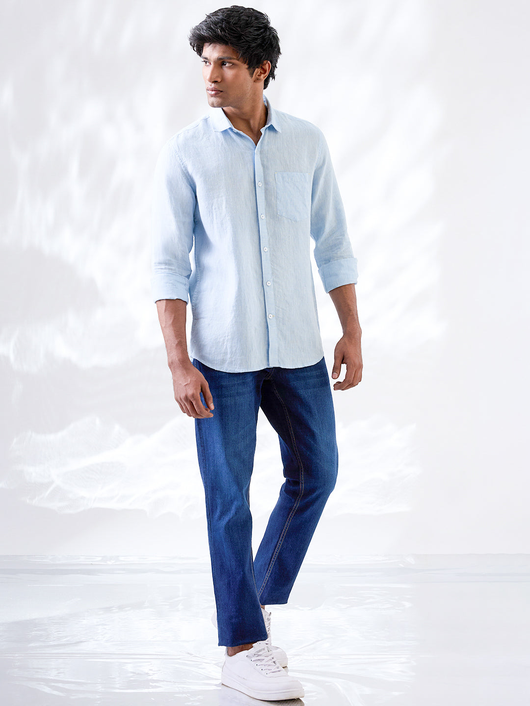 Solid blue shirt made from natural Indian linen, tailored in small batches